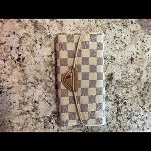 White checkered wallet